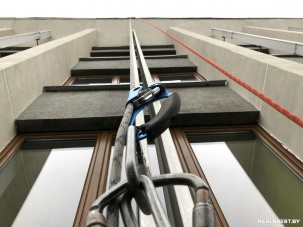 Фотограф-альпинист сделал фотографии с «веревок» на здании Брестского горисполкома